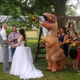 Image for article titled The Woman Who Wore a T-Rex Costume to Her Sister's Wedding Is the Best Person in America
